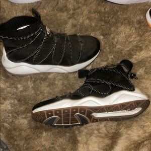 Black High-Top Sneakers with White Soles